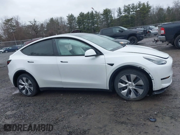 2020 Tesla Model Y Long Range with VIN 5YJYGDEE4LF044843, listed as a IAAI auction lot 41799504 with 40,770 mi miles and . Bid and sale history available at DreamBid. Image 13.