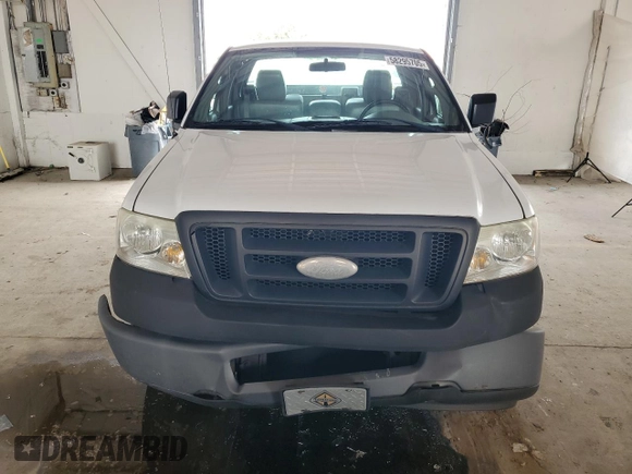 2007 Ford F-150 XL with VIN 1FTRF12297NA82401, listed as a Copart auction lot 58295705 with 198,470 mi miles and Salvage title. Bid and sale history available at DreamBid. Image 5.