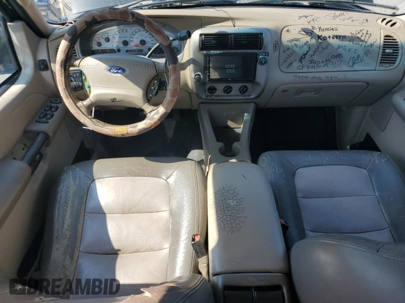 2004 Ford Explorer Sport Trac XLS with VIN 1FMZU67KX4UC35084, listed as a Copart auction lot 61967505 with 212,409 mi miles and Salvage title. Bid and sale history available at DreamBid. Image 8.