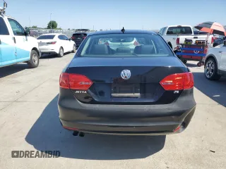 2014 Volkswagen Jetta SE z VIN 3VWD17AJ8EM424820, wystawiony jako Copart lot #63942515 z przebiegiem 180 530 mil mil oraz Czysty tytuł • Clean title. Historia ofert i sprzedaży dostępna na DreamBid. Obrazek 6.