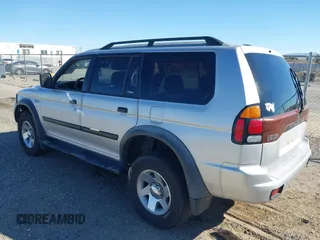 2003 Mitsubishi Montero Sport ES with VIN JA4LS21H23J002736, listed as a IAAI auction lot 41663572 with 235,704 mi miles. Bid and sale history available at carsss.com. Image 3.