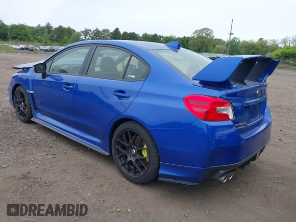 2020 Subaru WRX STI with VIN JF1VA2E61L9833954, listed as a IAAI auction lot 42336349 with 58,668 mi miles and . Bid and sale history available at DreamBid. Image 3.