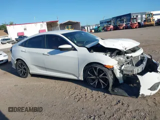 2017 Honda Civic LX with VIN 19XFC2F56HE004511, listed as a IAAI auction lot 42562420 with 59,975 mi miles and . Bid and sale history available at DreamBid. Image 13.