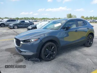 2023 Mazda CX-30 S Carbon Edition with VIN 3MVDMBCM4PM579080, listed as a IAAI auction lot 41941082 with 5,444 mi miles and . Bid and sale history available at carsss.com. Image 2.