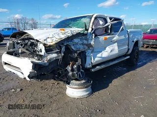 2015 Toyota Tacoma with VIN 3TMLU4EN8FM200529, listed as a IAAI auction lot 41602598 with 98,456 mi miles and . Bid and sale history available at DreamBid. Image 2.
