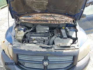 2009 Dodge Caliber SE z VIN 1B3HB28C79D198221, wystawiony jako IAAI lot #42412856 z przebiegiem Nie podano mil oraz . Historia ofert i sprzedaży dostępna na DreamBid. Obrazek 10.