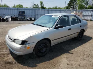 1999 Toyota Corolla VE with VIN 2T1BR12E4XC758873, listed as a Copart auction lot 59973665 with 399,277 mi miles and Salvage title. Bid and sale history available at DreamBid. Image 1.