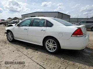 2015 Chevrolet Impala LTZ with VIN 2G1WC5E36F1123129, listed as a Copart auction lot 48795485 with 57,639 mi miles and Salvage Title. Bid and sale history available at DreamBid. Image 2.