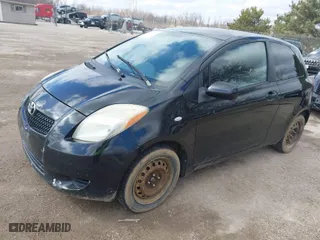 2008 Toyota Yaris with VIN JTDJT923685187475, listed as a IAAI auction lot 41860961 with 223,841 mi miles. Bid and sale history available at carsss.com. Image 2.