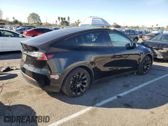 2024 Tesla Model Y Long Range z VIN 7SAYGAEE2RF075681, wystawiony jako Copart lot #86433524 z przebiegiem 18 640 mil mil oraz Szkoda całkowita • Salvage title. Historia ofert i sprzedaży dostępna na DreamBid. Obrazek 3.