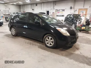 2005 Toyota Prius z VIN JTDKB20U953034977, wystawiony jako IAAI lot #42177898 z przebiegiem 199 079 mil mil oraz . Historia ofert i sprzedaży dostępna na DreamBid. Obrazek 1.