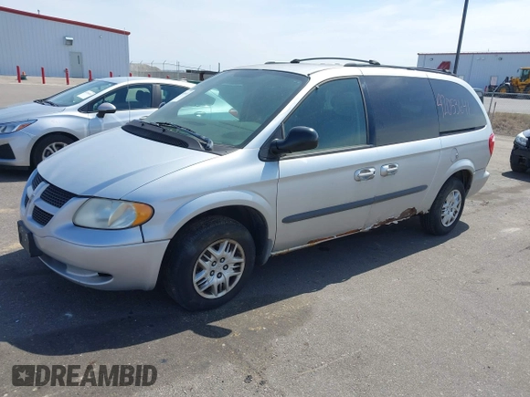 2003 Dodge Grand Caravan with VIN 2D4GP44303R281610, listed as a IAAI auction lot 42053641 with 196,877 mi miles and . Bid and sale history available at DreamBid. Image 2.