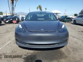 2023 Tesla Model 3 с VIN 5YJ3E1EAXPF607931, выставлен на аукционе Copart как лот 52629305 с пробегом 87 785 миль миль и Списание • Salvage title. История ставок и продаж доступна на DreamBid. Изображение 5.