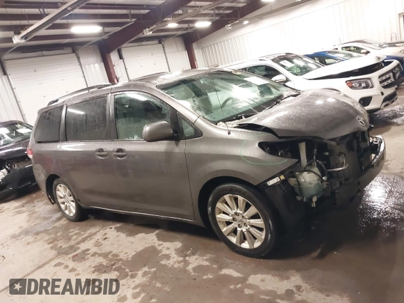 2011 Toyota Sienna LE with VIN 5TDJK3DC2BS013045, listed as a IAAI auction lot 41127037 with 239,401 mi miles. Bid and sale history available at carsss.com. Image 14.