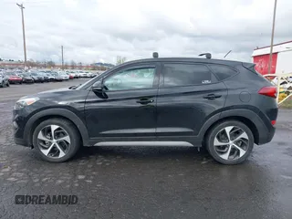 2017 Hyundai Tucson Value with VIN KM8J3CA28HU394750, listed as a IAAI auction lot 41960452 with 138,134 mi miles. Bid and sale history available at carsss.com. Image 14.