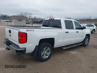2014 Chevrolet Silverado 1500 LT with VIN 3GCUKREC6EG194197, listed as a IAAI auction lot 41999718 with 206,916 mi miles and . Bid and sale history available at DreamBid. Image 4.