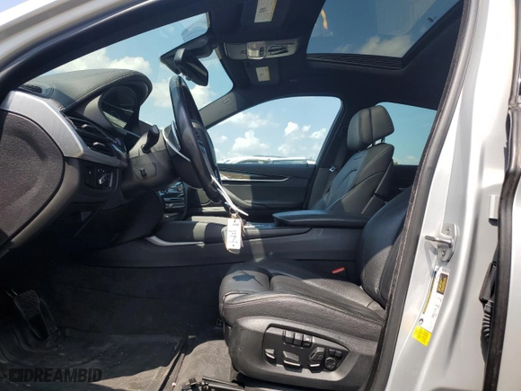 2019 BMW X6 sDrive35i with VIN 5UXKU0C57K0S97385, listed as a Copart auction lot 69103994 with 44,186 mi miles and Salvage Title. Bid and sale history available at carsss.com. Image 7.