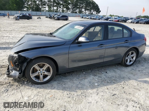 2014 BMW 3 Series 328i with VIN WBA3A5G50ENP33259, listed as a Copart auction lot 57330615 with 217,779 mi miles and Salvage title. Bid and sale history available at DreamBid. Image 1.