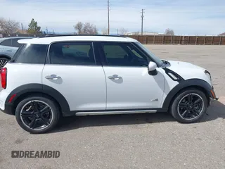 2016 MINI Countryman S with VIN WMWZC5C57GWU22015, listed as a IAAI auction lot 41806547 with 65,124 mi miles and . Bid and sale history available at DreamBid. Image 14.