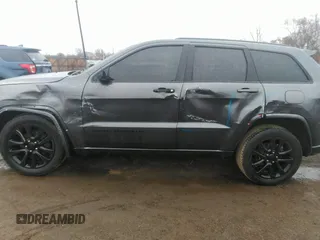 2017 Jeep Grand Cherokee Altitude with VIN 1C4RJFAG2HC926896, listed as a IAAI auction lot 41810504 with 100,337 mi miles and . Bid and sale history available at DreamBid. Image 14.