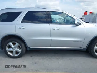 2013 Dodge Durango Citadel with VIN 1C4RDHEG0DC571833, listed as a IAAI auction lot 42736033 with 110,808 mi miles and . Bid and sale history available at DreamBid. Image 13.