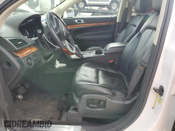 2014 Lincoln MKT EcoBoost with VIN 2LMHJ5ATXEBL58623, listed as a Copart auction lot 48222015 with 255,495 mi miles and Clean Title. Bid and sale history available at DreamBid. Image 7.