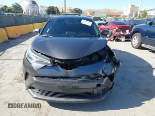 2018 Toyota C-HR XLE with VIN NMTKHMBX4JR024785, listed as a IAAI auction lot 42386488 with 83,230 mi miles and . Bid and sale history available at DreamBid. Image 13.