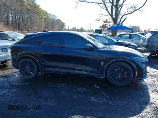 2023 Ford Mustang Mach-E GT z VIN 3FMTK4SX5PMA24192, wystawiony jako IAAI lot #41431780 z przebiegiem 10 394 mil mil oraz . Historia ofert i sprzedaży dostępna na DreamBid. Obrazek 13.