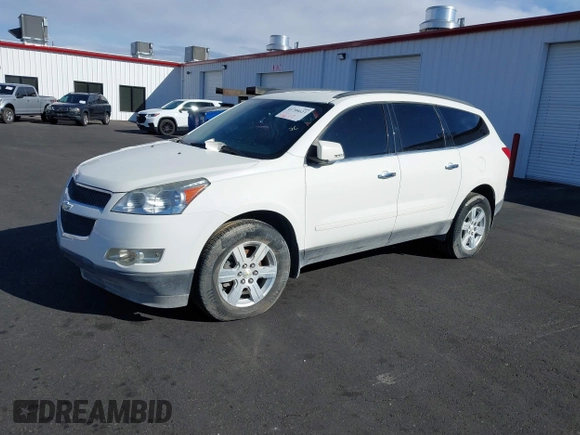 2012 Chevrolet Traverse 1LT with VIN 1GNKRGED9CJ131856, listed as a IAAI auction lot 41708623 with 77,329 mi miles and . Bid and sale history available at DreamBid. Image 2.