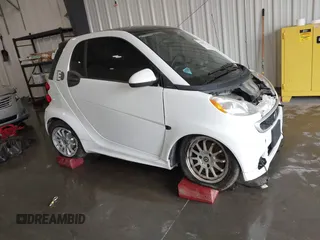 2014 Smart fortwo Passion with VIN WMEEJ9AA1EK729572, listed as a IAAI auction lot 41709239 with 31,044 mi miles and . Bid and sale history available at DreamBid. Image 1.