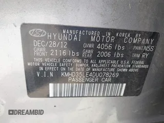 2013 Hyundai Elantra GT with VIN KMHD35LE4DU078269, listed as a IAAI auction lot 41811795 with 116,458 mi miles. Bid and sale history available at carsss.com. Image 9.