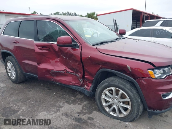 2022 Jeep Grand Cherokee Laredo X with VIN 1C4RJEAG0NC128094, listed as a IAAI auction lot 41402308 with 34,190 mi miles and . Bid and sale history available at DreamBid. Image 6.