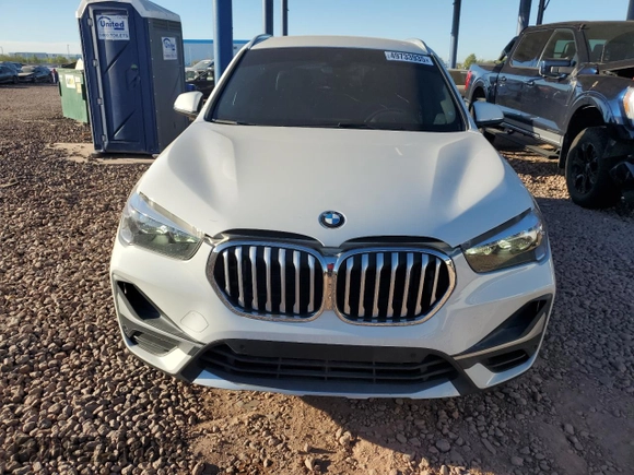 2021 BMW X1 xDrive28i with VIN WBXJG9C08M5U21413, listed as a Copart auction lot 49733935 with 44,220 mi miles and Salvage Title. Bid and sale history available at carsss.com. Image 5.
