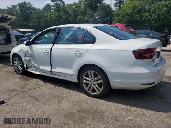 2017 Volkswagen Jetta SEL with VIN 3VWL17AJ2HM211751, listed as a Copart auction lot 61907755 with 64,668 mi miles and Salvage title. Bid and sale history available at DreamBid. Image 2.