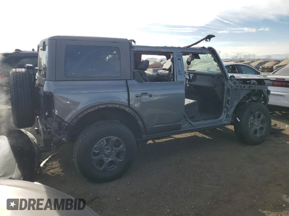 2024 Ford Bronco Big Bend z VIN 1FMDE7BH9RLA85832, wystawiony jako Copart lot #86171994 z przebiegiem 1 196 mil mil oraz Szkoda całkowita • Salvage title. Historia ofert i sprzedaży dostępna na DreamBid. Obrazek 3.