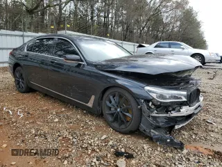 2016 BMW 7 Series 750i with VIN WBA7F0C55GGM20825, listed as a Copart auction lot 47743955 with 0 mi miles and Salvage Title. Bid and sale history available at carsss.com. Image 4.