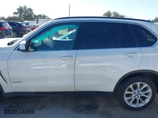 2016 BMW X5 xDrive35i with VIN 5UXKR0C56G0P34365, listed as a IAAI auction lot 41588869 with 105,250 mi miles. Bid and sale history available at carsss.com. Image 14.