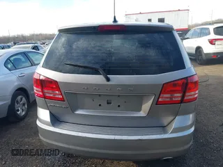 2015 Dodge Journey SE z VIN 3C4PDCAB3FT641675, wystawiony jako IAAI lot #41898611 z przebiegiem 218 121 mil mil oraz . Historia ofert i sprzedaży dostępna na DreamBid. Obrazek 17.