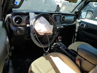 2023 Jeep Wrangler Sport with VIN 1C4HJXAG3PW672856, listed as a Copart auction lot 70444274 with 6,077 mi miles and Salvage title. Bid and sale history available at DreamBid. Image 8.