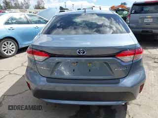 2021 Toyota Corolla Hybrid LE with VIN JTDEAMDE0MJ026601, listed as a IAAI auction lot 41797452 with 85,294 mi miles. Bid and sale history available at carsss.com. Image 16.