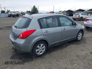 2012 Nissan Versa S with VIN 3N1BC1CP1CK807948, listed as a IAAI auction lot 41772063 with 87,126 mi miles. Bid and sale history available at carsss.com. Image 4.