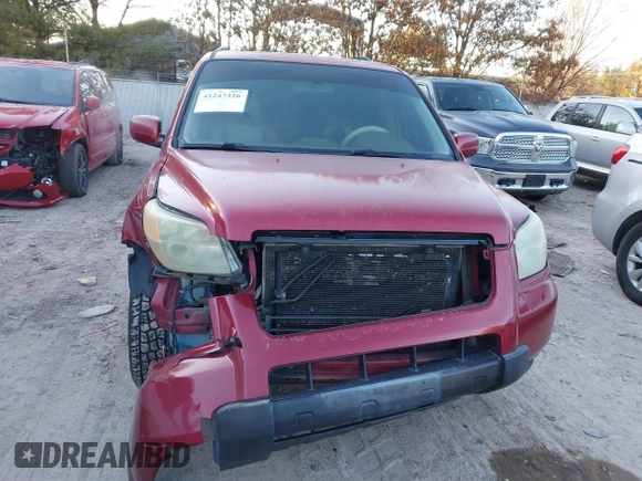 2006 Honda Pilot EX-L with VIN 5FNYF28586B005602, listed as a IAAI auction lot 41247326 with 221,698 mi miles and . Bid and sale history available at DreamBid. Image 12.