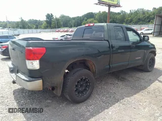 2012 Toyota Tundra с VIN 5TFRM5F12CX041427, выставлен на аукционе IAAI как лот 37122352 с пробегом 187 700 миль миль и . История ставок и продаж доступна на DreamBid. Изображение 4.