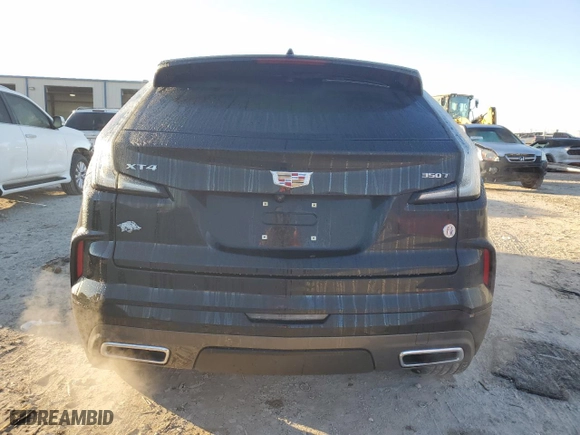 2024 Cadillac XT4 FWD Sport with VIN 1GYFZER47RF101186, listed as a Copart auction lot 79128454 with 10,499 mi miles and Salvage Title. Bid and sale history available at carsss.com. Image 6.