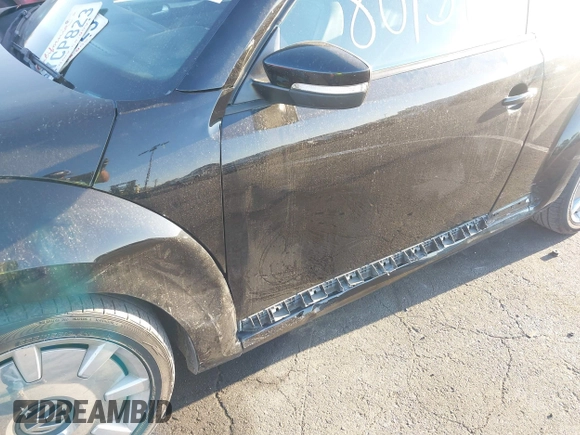 2012 Volkswagen Beetle 2.5L w/Sound/Nav PZEV with VIN 3VWJP7AT7CM661055, listed as a IAAI auction lot 41980159 with 113,678 mi miles and . Bid and sale history available at DreamBid. Image 6.