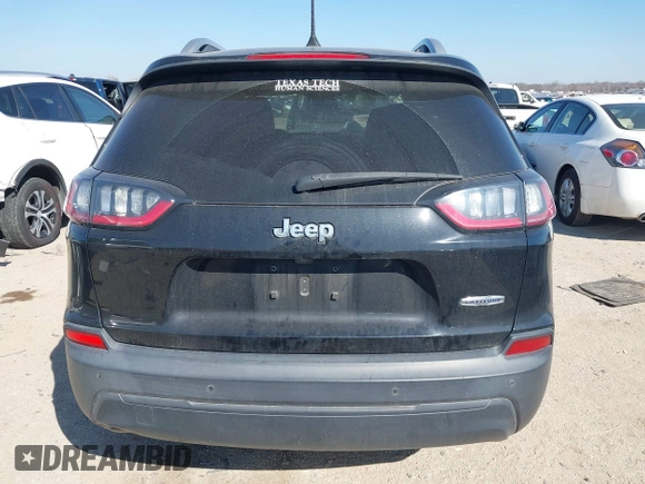 2019 Jeep Cherokee Latitude Plus with VIN 1C4PJLLB4KD312411, listed as a IAAI auction lot 41677041 with 82,802 mi miles and . Bid and sale history available at DreamBid. Image 16.