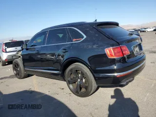 2019 Bentley Bentayga V8 z VIN SJAAM2ZV5KC024154, wystawiony jako Copart lot #74990344 z przebiegiem 41 589 mil mil oraz Szkoda całkowita • Salvage title. Historia ofert i sprzedaży dostępna na DreamBid. Obrazek 2.