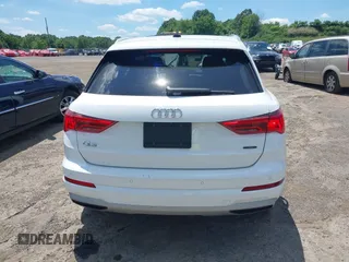 2020 Audi Q3 Premium z VIN WA1AECF39L1010852, wystawiony jako IAAI lot #39768583 z przebiegiem 100 414 mil mil oraz . Historia ofert i sprzedaży dostępna na DreamBid. Obrazek 16.