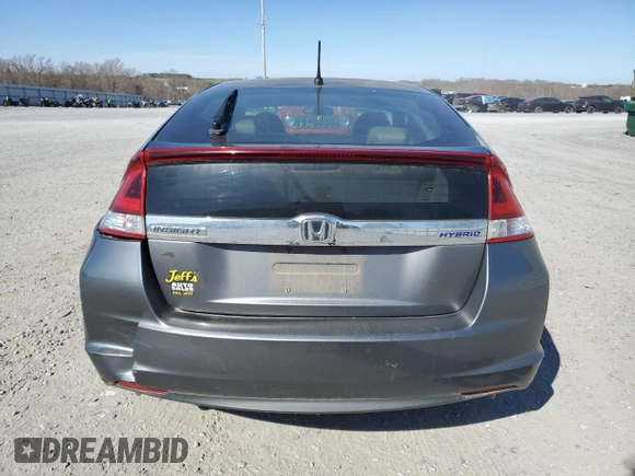 2012 Honda Insight EX z VIN JHMZE2H76CS001683, wystawiony jako Copart lot #49061885 z przebiegiem 259 158 mil mil oraz Szkoda całkowita • Salvage title. Historia ofert i sprzedaży dostępna na DreamBid. Obrazek 6.
