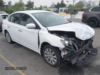2019 Nissan Sentra S z VIN 3N1AB7AP1KY232900, wystawiony jako IAAI lot #42140616 z przebiegiem 104 966 mil mil oraz . Historia ofert i sprzedaży dostępna na DreamBid. Obrazek 1.